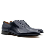 Il Gergo Cooper Cap-Toe Shoes Book Blue